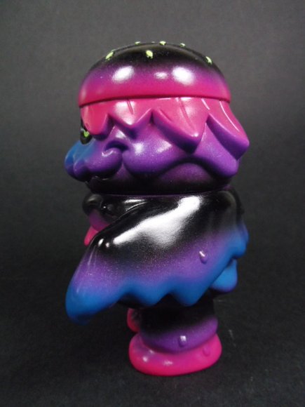 Patty Power - Pearlescent Purple figure by Arbito, produced by Super7. Side view.