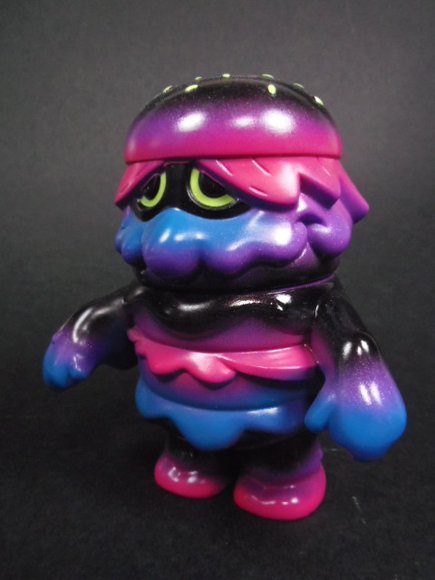 Patty Power - Pearlescent Purple figure by Arbito, produced by Super7. Side view.