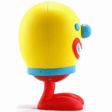 Baby Clown figure by Doma, produced by Kidrobot. Side view.