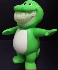 barney grin figure by Ron English. Front view.