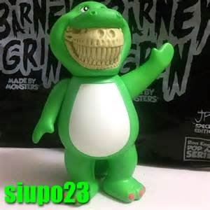 Barney rex grin figure by Ron English. Front view.