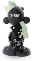 Billy Bananas X-Ray Edition figure by Tristan Eaton, produced by Thunderdog Studios. Back view.