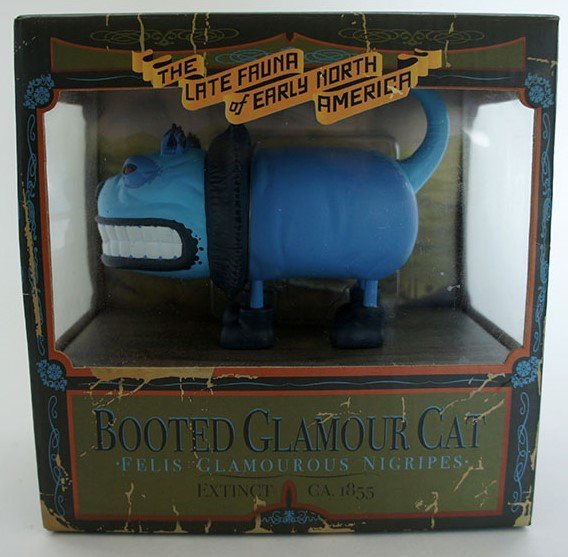 Booted Glamour Cat - Indigo figure by Scott Musgrove, produced by Strangeco. Packaging.