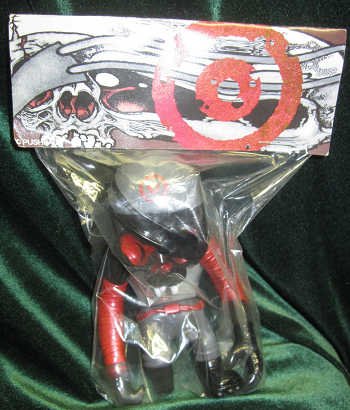 Bullseye Skullpirate Mirror Wing figure by Pushead, produced by Secret Base. Packaging.