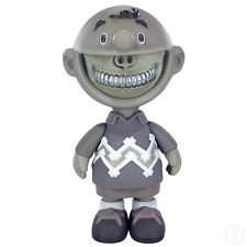 charlie grin mono platinum figure by Ron English. Front view.