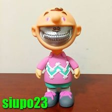 charlie grin pink platinum figure by Ron English. Front view.