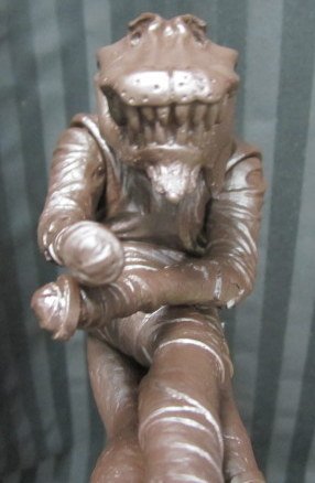 Cococroc - Brown figure by Pushead, produced by Cosmo Liquid Garage Toy. Detail view.
