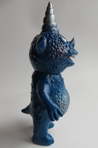CoroCoro - Blue figure by Zollmen, produced by Zollmen. Side view.