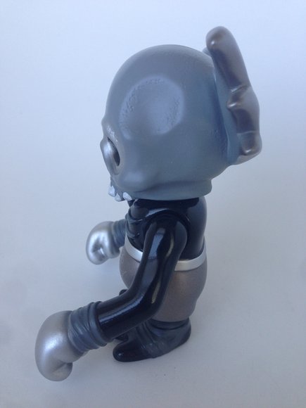 Darkness Skullwing  figure by Pushead, produced by Secret Base. Side view.