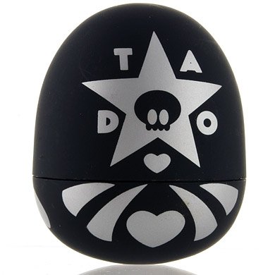 Black Daruma figure by Tado, produced by Kidrobot. Back view.