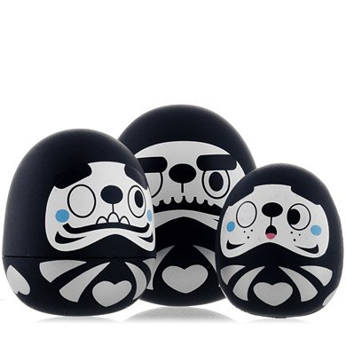 Black Daruma figure by Tado, produced by Kidrobot. Detail view.