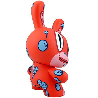 RED MOD figure by Gary Baseman, produced by Kidrobot. Side view.