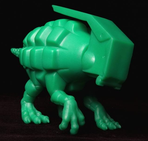 Dinogrenade figure by Ron English, produced by Popaganda. Side view.