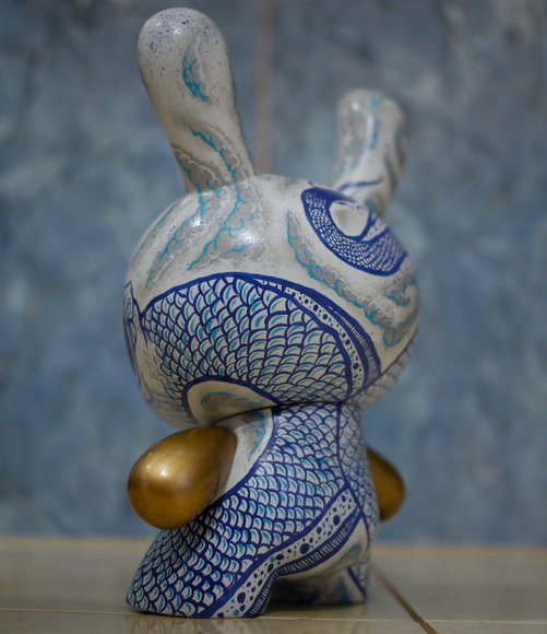 Dragon Dunny figure by Mr. Lister, produced by Kidrobot. Side view.