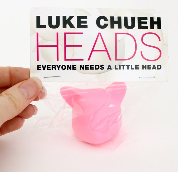 Everyone Needs A Little Head - Clutter Exclusive figure by Luke Chueh. Packaging.