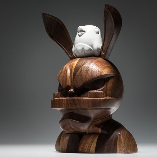 Glitch Walnut figure by Coarsetoys, produced by Coarsetoys. Front view.
