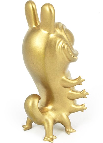 Hug the Killer - Gold figure by Nikopicto, produced by Mighty Jaxx. Back view.