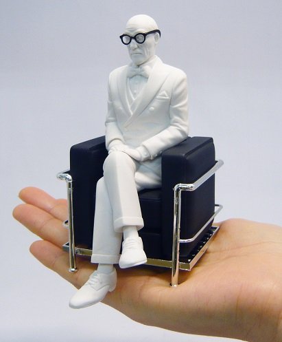 Great Master Le Corbusier in LC2 chair figurine figure, produced by Reac Japan. Detail view.