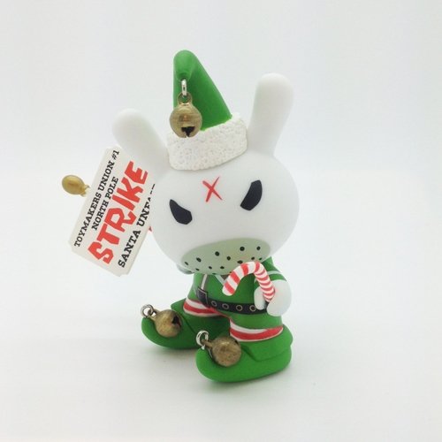 Grumpy Elf Dunny figure by Frank Kozik, produced by Kidrobot. Front view.