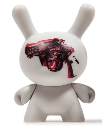 Gun figure by Andy Warhol, produced by Kidrobot. Front view.