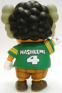 KAWS Hasheem figure by Kaws, produced by Original Fake. Back view.