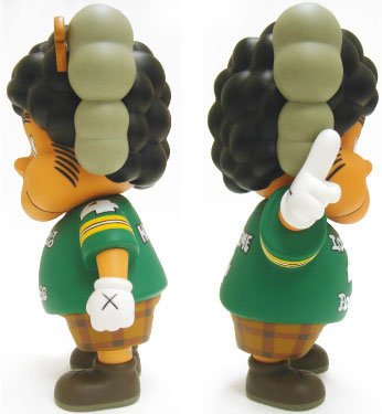 KAWS Hasheem figure by Kaws, produced by Original Fake. Side view.