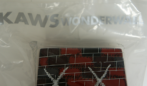 KAWS x Wonderwall - Brick figure by Kaws, produced by Medicom Toy. Detail view.