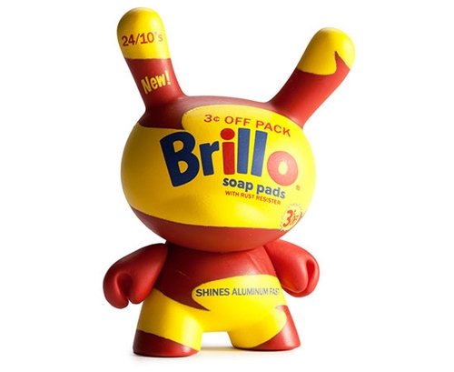 Kidrobot x Andy Warhol Yellow Brillo figure by Andy Warhol, produced by Kidrobot. Front view.