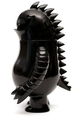 Leroy C. - Unpainted Black figure by Invisible Creature, produced by Super7. Side view.