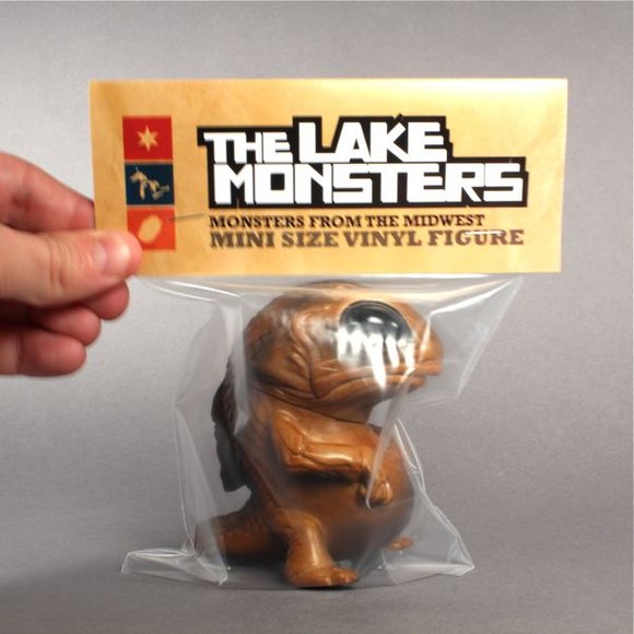 Mud Puddle Snybora figure by Chris Ryniak, produced by Squibbles Ink + Rotofugi. Packaging.