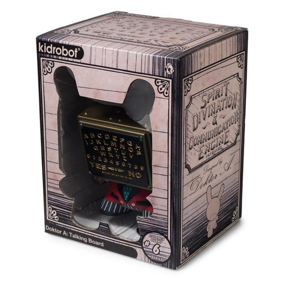 Ouija figure by Doktor A, produced by Kidrobot. Packaging.