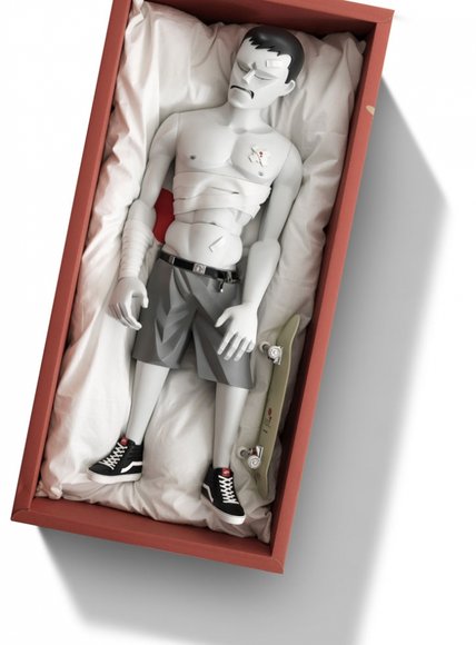 Pain 1:3 figure by Mark Landwehr, produced by Coarsetoys. Packaging.