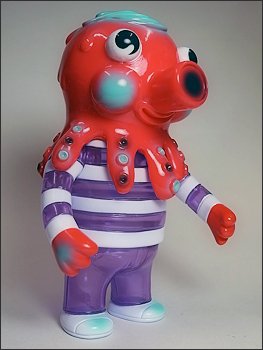 New Year Globby - Red & Clear Purple figure by Bwana Spoons, produced by Gargamel. Side view.