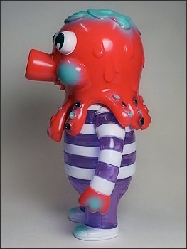 New Year Globby - Red & Clear Purple figure by Bwana Spoons, produced by Gargamel. Side view.