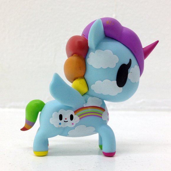 Pixie figure by Simone Legno (Tokidoki), produced by Tokidoki. Side view.