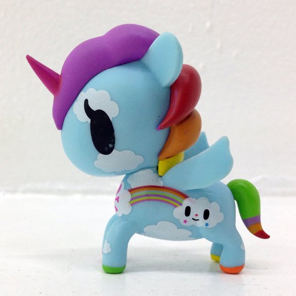 Pixie figure by Simone Legno (Tokidoki), produced by Tokidoki. Side view.