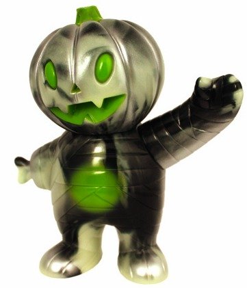 Pumpkin Boy - Black And Glow Swirl figure by Brian Flynn, produced by Super7. Front view.