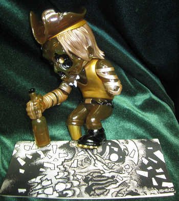 Skull Captain - Ye Oily Pillager Zee Float figure by Pushead, produced by Secret Base. Packaging.