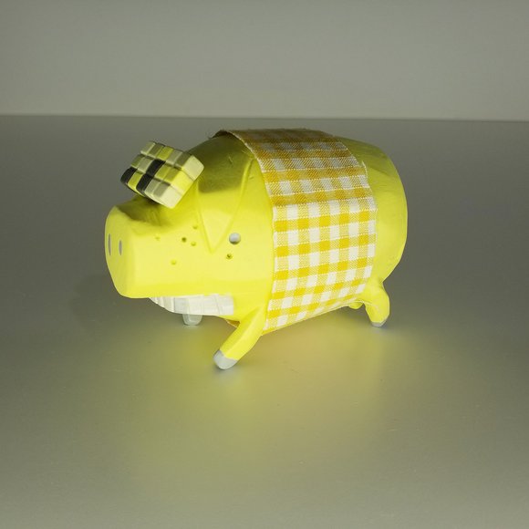 The Pig - Yellow figure by Michael Lau, produced by Crazysmiles. Front view.