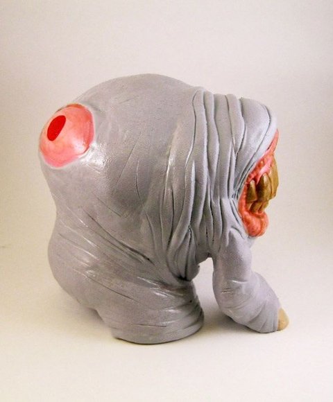 The Treature: Glutton Type figure by Motorbot. Side view.