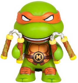 TMNT OOZE ACTION GLOW IN THE DARK MICHELANGELO figure by Viacom, produced by Kidrobot. Front view.