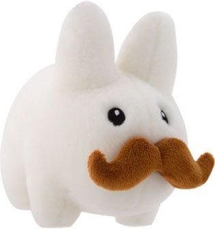 Stache Labbit figure by Frank Kozik, produced by Kidrobot. Front view.