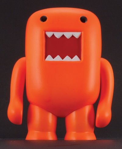 Domo Black Light - Orange figure, produced by Dark Horse. Front view.
