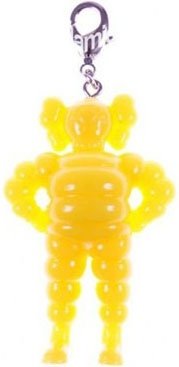 Chum Keychain - Yellow figure by Kaws, produced by Original Fake. Front view.