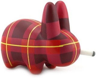 Plaid Smorkin Labbit figure by Frank Kozik, produced by Kidrobot. Front view.