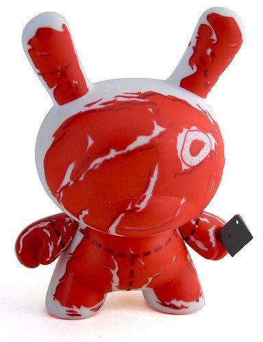 Ribeye figure by Travis Cain, produced by Kidrobot. Front view.