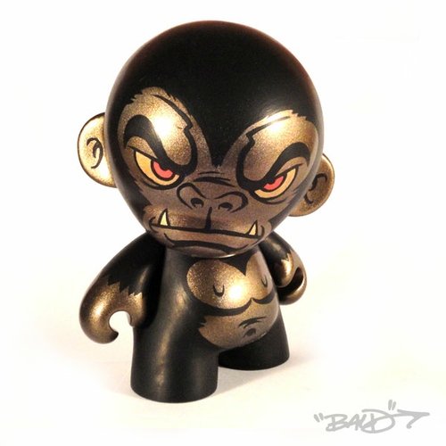 The Golden Gorilla figure by Bryan Lopez (B.A.L.D.), produced by Kidrobot. Front view.