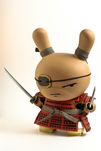 Red Shogun Dunny figure by Huck Gee, produced by Kidrobot. Front view.