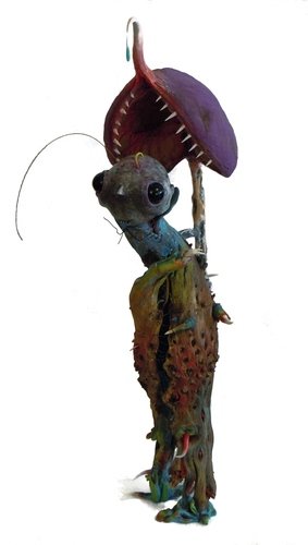 Dhatūrā figure by 23Spk. Front view.