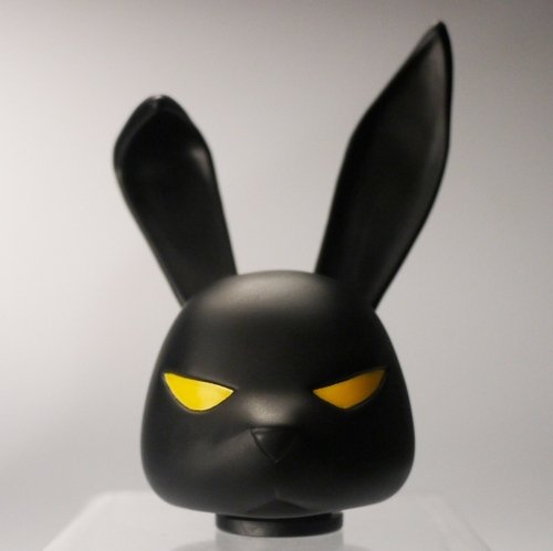 Everyone needs a little head figure by Luke Chueh, produced by Munky King. Front view.
